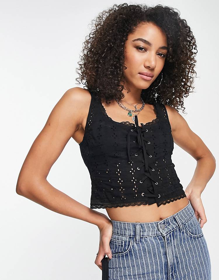 Reclaimed Vintage Inspired eyelet cami top with lace up detail in black